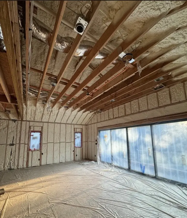 Interior walls and ceiling insulated with spray foam during new construction in Morgan Hill